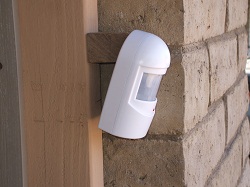 Finished installation of driveway alert system transmitter