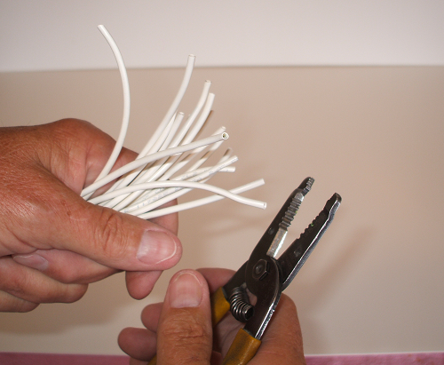 Snipping wire ends while listening for chirp from continuity tester